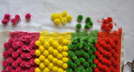 cojines con pompones